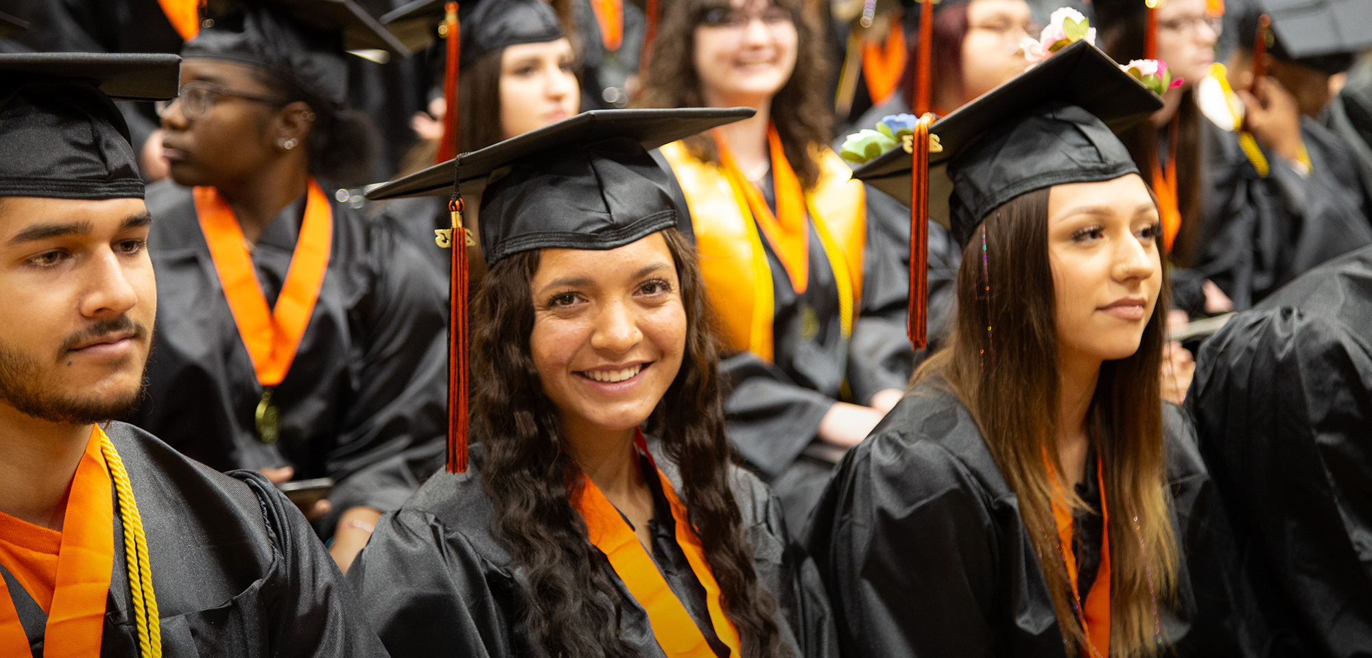 students at commencement ceremonies