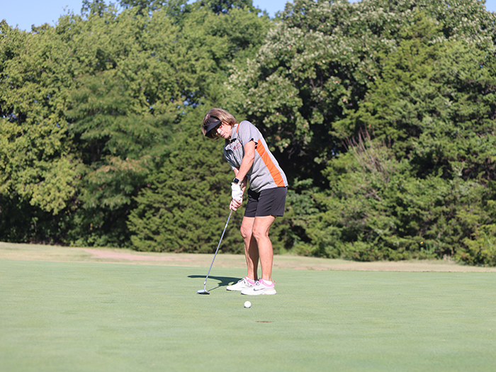 michelle schoon playing in the golf tournament